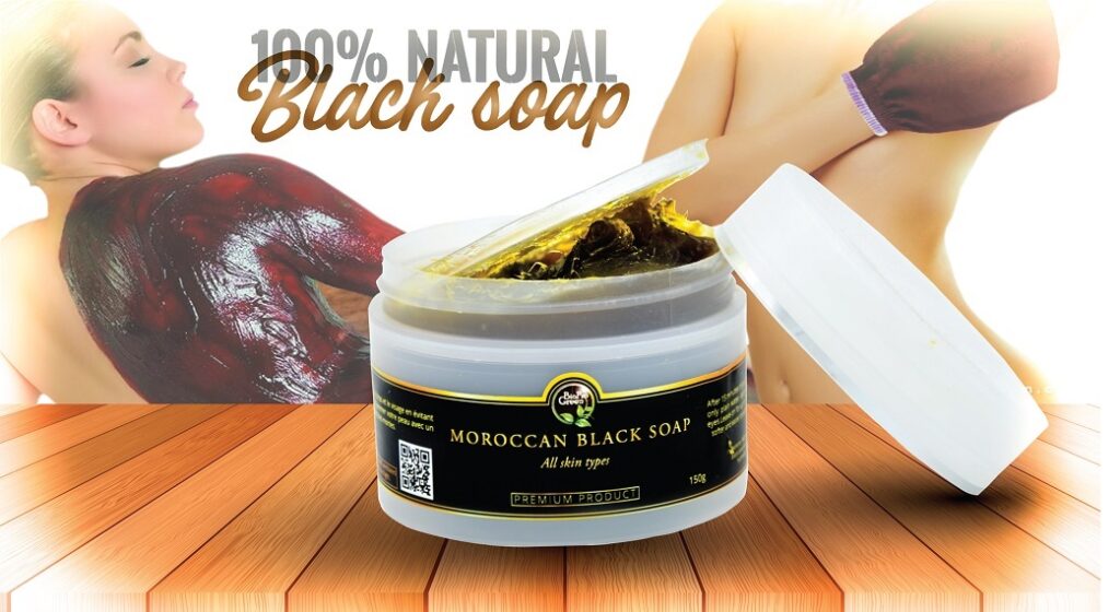 Woman applying Soap 
Woman applying black Soap and exfoliate with Kessa glove -authentic hammam skincare ritual.